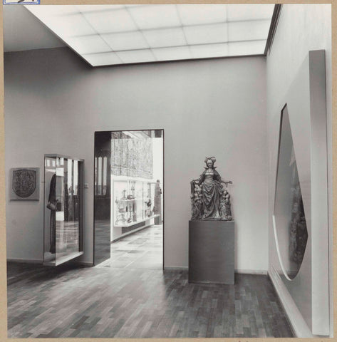 Room with statue, liturgical robes in showcases and a passage, 1961 Canvas Print