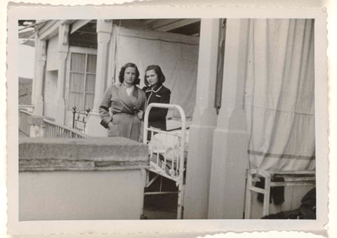 Isabel Wachenheimer in dressing gown standing in front of the entrance to an open-air hospital room in the Jewish sanatorium Etania with an unknown woman in Davos, April 1946, anonymous, 1946 Canvas Print