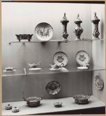 Display case with ceramic objects including sauce bowls, pots and plates, c. 1959 Canvas Print