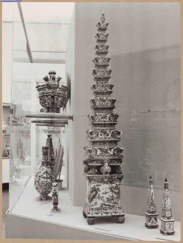 Display case with ceramic objects, including a flower pyramid and two obelisks, c. 1959 Canvas Print