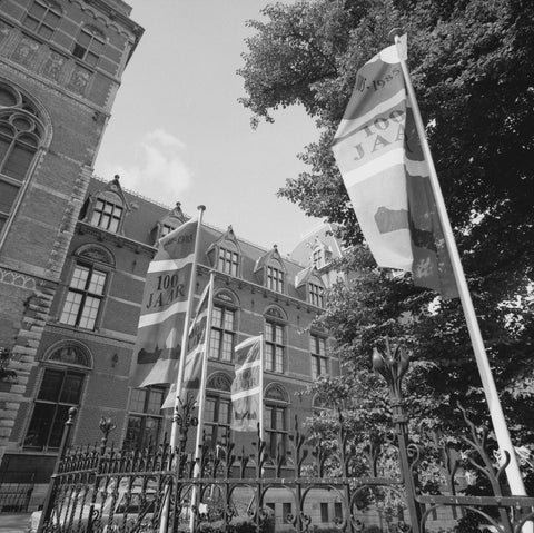 North facade with three flags behind a fence, c. 1985 Canvas Print