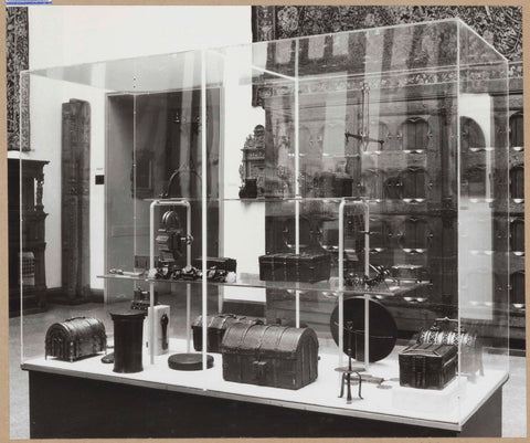 Display case with various objects including chests, c. 1959 Canvas Print