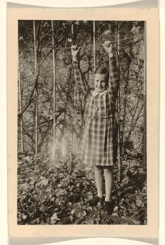 Isabel Wachenheimer with outstretched arms and hands on a rope in front of a pond, October 1936, anonymous, 1936 Canvas Print