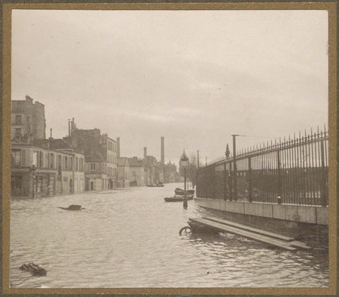 Flooded street with a fence during the flood of Paris, G. Dangereux, 1910 Canvas Print