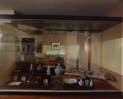 Room (probably 107) with display cases including a model of the island of Deshima, a boat, ceramics, boxes and figurine, 1999 Canvas Print