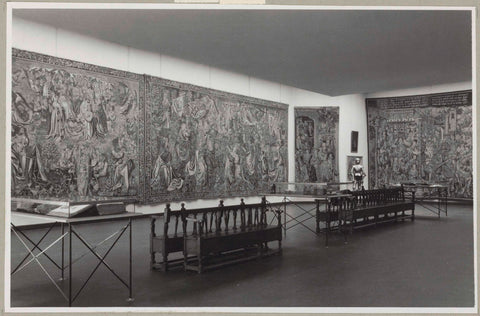 Room with tapestries, display cases with books, a harness and benches, c. 1951 Canvas Print