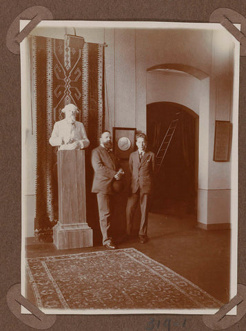 Two gentlemen pose next to the bust of P.J.H. Cuypers in 1927, 1927 Canvas Print