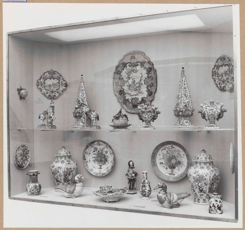 Display case with ceramic objects, including bowls, vases and terrines, c. 1959 Canvas Print