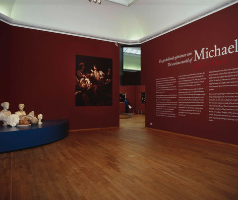 Entrance to the exhibition with the exhibition title on the right and some busts on the left, c. 2002 Canvas Print