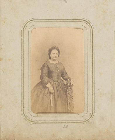 Portrait of a woman with a cap and a long skirt, anonymous, c. 1860 - c. 1880 Canvas Print