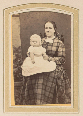 Portrait of a woman in a plaid dress with a baby on her lap, E. Steffen, 1860 - 1897 Canvas Print