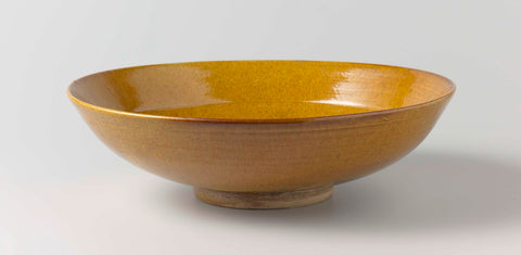 Saucer dish with an ochre yellow glaze, anonymous, c. 900 - c. 1099 Canvas Print