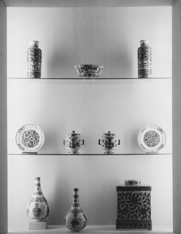 Display case with Chinese blue-white porcelain including vases, 1957 Canvas Print