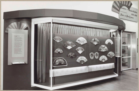 Room with a display case with various fans, c. 1992 - c. 1993 Canvas Print