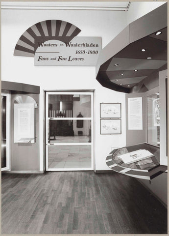 Entrance to the exhibition with above the door the exhibition title and to the right framed fan sheets and a book with drawings, c. 1992 - c. 1993 Canvas Print