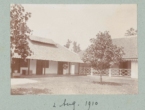 The courtyard garden at a number of houses with a staff member on the veranda with a tray in hand, Frits Freerks Fontein Fz. (attributed to), c. 1903 Canvas Print