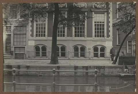 Façade of the Police Headquarters at Oudezijds Achterburgwal 185 in Amsterdam, with on the right the entrance of the Spinhuissteeg, anonymous, c. 1900 - before c. 1910 Canvas Print