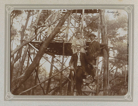 Two men and a woman posing in a wooden watchtower, Folkert Idzes de Jong, 1906 Canvas Print