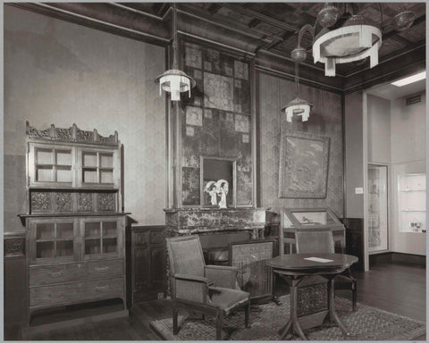 Room with wall and ceiling panelling, wallpaper, fireplace, cupboards, table, chairs, lamps and a passageway, c. 1983 Canvas Print