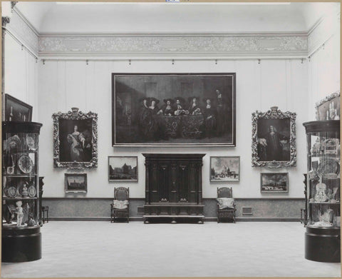 Room with paintings and chairs on either side of a cupboard, after 1925 - before 1939 Canvas Print