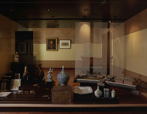 Room (probably 107) with display cases including a model of the island of Deshima, a boat, ceramics, boxes and figurine, 1998 Canvas Print