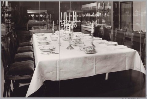 Display case with chairs and a set table with plates, terrines, baskets, cutlery and candlesticks, c. 1988 Canvas Print