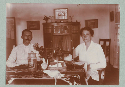 Portrait of a man and woman at the table., Frits Freerks Fontein Fz. (attributed to), c. 1914 Canvas Print