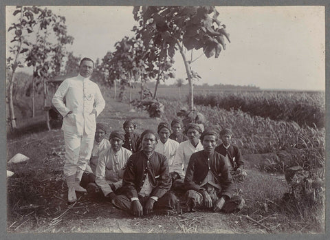 Superintendent with workers, anonymous, c. 1900 - 1919 Canvas Print