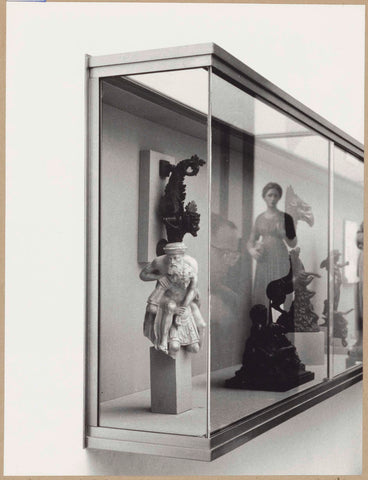 Corner of a display case with sculptures, 1961 Canvas Print