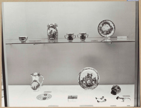 Display case with ceramic objects, including a multicolored painted head of Meissen porcelain, 1962 Canvas Print