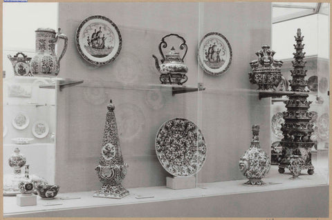 Display case with ceramic objects, including an obelisk, a bowl and a flower holder, c. 1959 Canvas Print