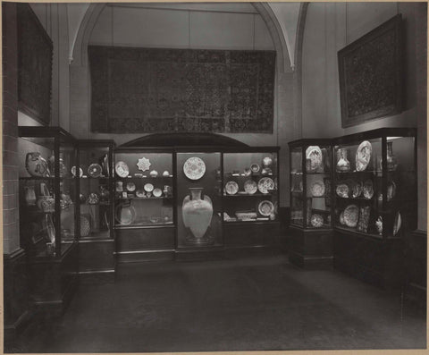 Room with showcases with ceramics and tapestries, c. 1938 Canvas Print