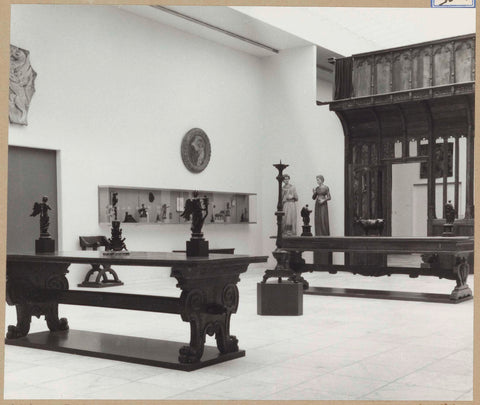 Room with oksaal, furniture including two tables, majolica and statues, 1961 Canvas Print