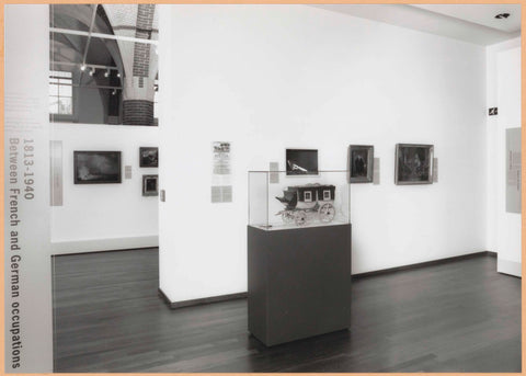 Room with a display case at the front with a model of a stagecoach from the period 1813-1940, 1996 Canvas Print