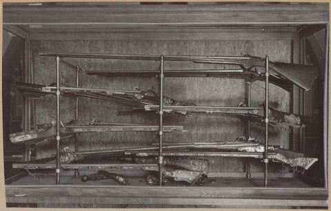 Display case with rifles, c. 1900 - c. 1974 Canvas Print