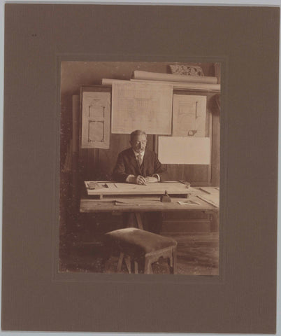 J. van Tetterode, sitting behind a desk in the middle of construction drawings, c. 1906 Canvas Print