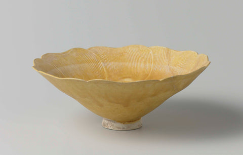 Bowl in the shape of a flower with a yellow glaze, anonymous, c. 1279 - c. 1368 Canvas Print