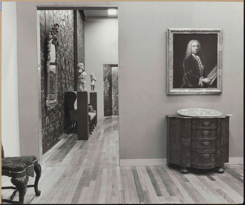 Room with painting (portrait) and chest of drawers with a view through to room with gold leather wallpaper, statues on pedestals and mirror, 1962 Canvas Print