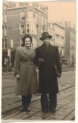 Isabel Wachenheimer in long coat with Leo Blumensohn with slit hat on the street in Amsterdam, May 1947, anonymous, 1947 Canvas Print