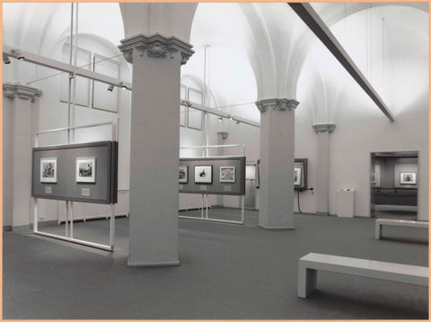 Room 130 of the Rijksprentenkabinet with various objects on panels and benches for visitors, c. 1996 Canvas Print