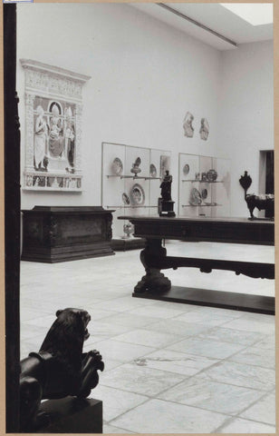 Corner of a room with various objects, including sculptures, majolica and furniture, c. 1961 Canvas Print