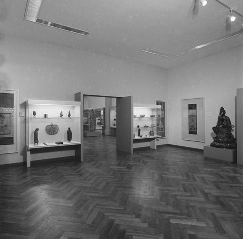 Room with two display cabinets next to a passageway and on the right an image of Bodhisattva Seishi, 1983 Canvas Print