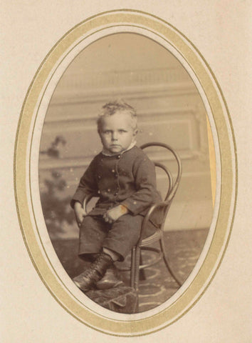 Portrait of a child on a chair with riding boots and a package, Johan Christiaan Reesinck, 1866 - c. 1900 Canvas Print