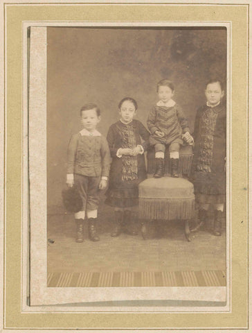 Portrait of four children at a chair, anonymous, c. 1870 - c. 1900 Canvas Print