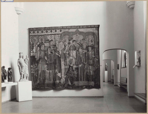 Hall with medieval sculptures including Mary with child, tomb figures, a tapestry and a passageway, 1962 Canvas Print