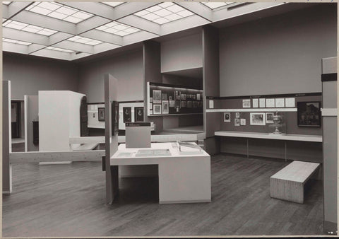 Room with various objects, information panels, a bench for visitors and a passage with a staircase, c. 1975 Canvas Print