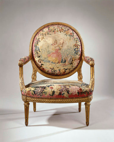 Armchair upholstered in tapestry depicting a dancing girl (petite danseuse) (back) and the fable of the heron (seat), Manufacture Royale des Gobelins, c. 1935 Canvas Print