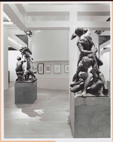 Room with two sculptures and prints along a circular wall, c. 1998 - c. 1999 Canvas Print