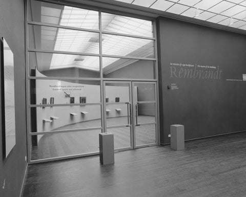 Glass doors next to a wall with the exhibition title, c. 1991 - c. 1992 Canvas Print