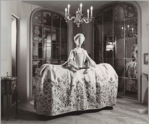 Display case with doll with clothing in an interior, in or after 1983 - c. 2003 Canvas Print